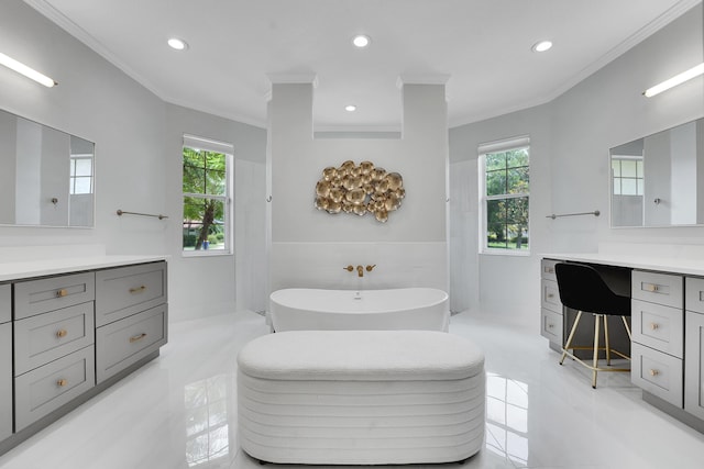 4450 SW Long Bay Dr, Palm City, FL 34990 - bathroom featuring ornamental molding, a soaking tub, vanity, recessed lighting, and a walk in shower