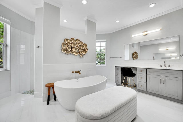4450 SW Long Bay Dr, Palm City, FL 34990 - bathroom with crown molding, plenty of natural light, vanity, a freestanding tub, and walk in shower