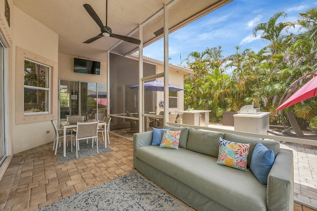 4450 SW Long Bay Dr, Palm City, FL 34990 - view of patio / terrace with outdoor dining area, outdoor lounge area, a ceiling fan, and area for grilling