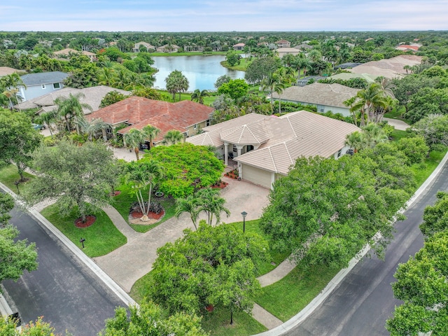 4450 SW Long Bay Dr, Palm City, FL 34990 - aerial perspective of suburban area with a large body of water and a tree filled landscape