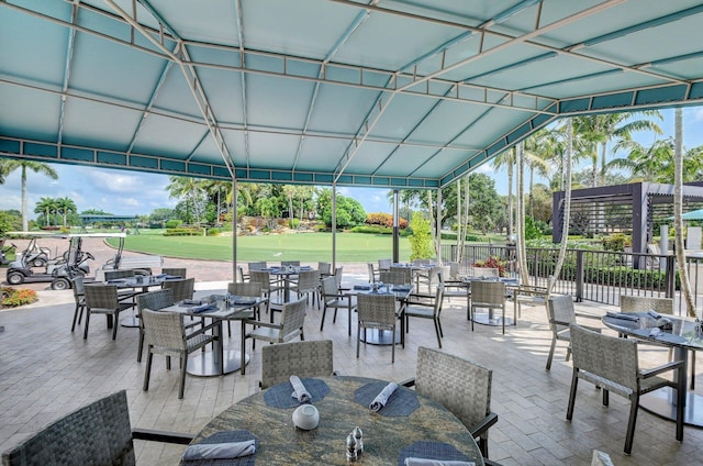 16000 Loch Katrine Trl Unit 8002, Delray Beach, FL 33446 - view of patio / terrace featuring outdoor dining space and golf course view