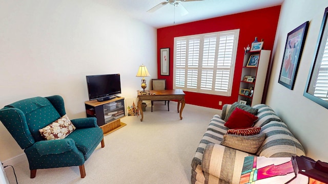 11710 SW Apple Blossom Trl, Port Saint Lucie, FL 34987 - living area with healthy amount of natural light, ceiling fan, carpet floors, and baseboards