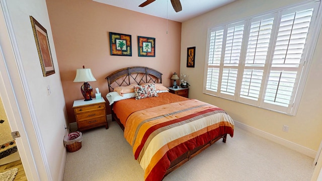 11710 SW Apple Blossom Trl, Port Saint Lucie, FL 34987 - carpeted bedroom with baseboards and a ceiling fan