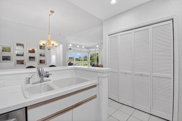 20220 Boca W Dr Unit 1104, Boca Raton, FL 33434 - kitchen with appliances with stainless steel finishes, light tile patterned floors, white cabinets, light countertops, and recessed lighting