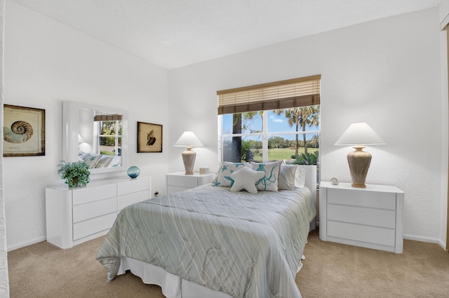 20220 Boca W Dr Unit 1104, Boca Raton, FL 33434 - kitchen featuring freestanding refrigerator, light tile patterned flooring, light countertops, a chandelier, and a textured wall