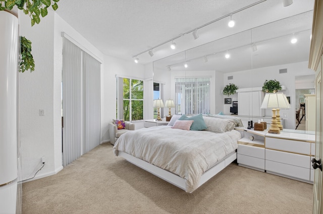 20220 Boca W Dr Unit 1104, Boca Raton, FL 33434 - bedroom with light carpet, a closet, and recessed lighting
