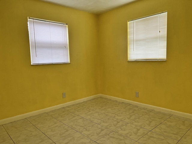 5042 Eadie Pl, West Palm Beach, FL 33407 - unfurnished room featuring baseboards