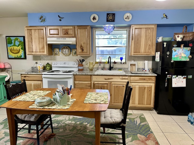 3595 SW 19th St, Okeechobee, FL 34974 - kitchen featuring freestanding refrigerator, a sink, white range with electric stovetop, under cabinet range hood, and light tile patterned floors