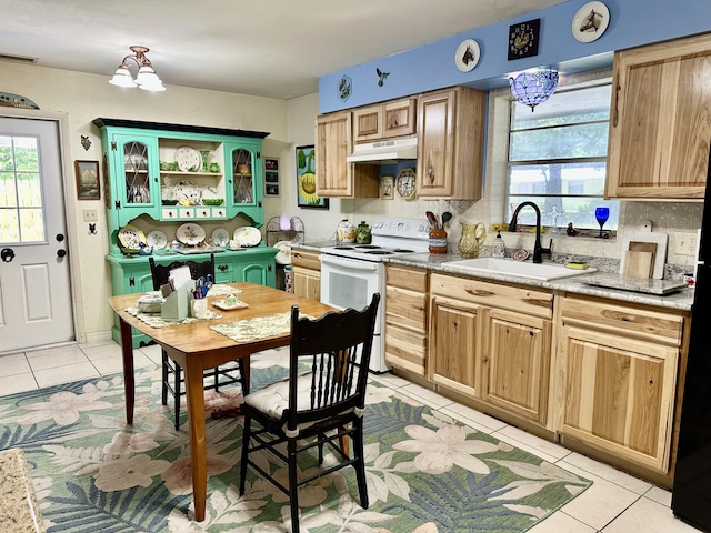 3595 SW 19th St, Okeechobee, FL 34974 - kitchen featuring white range with electric stovetop, under cabinet range hood, a sink, light tile patterned floors, and open shelves