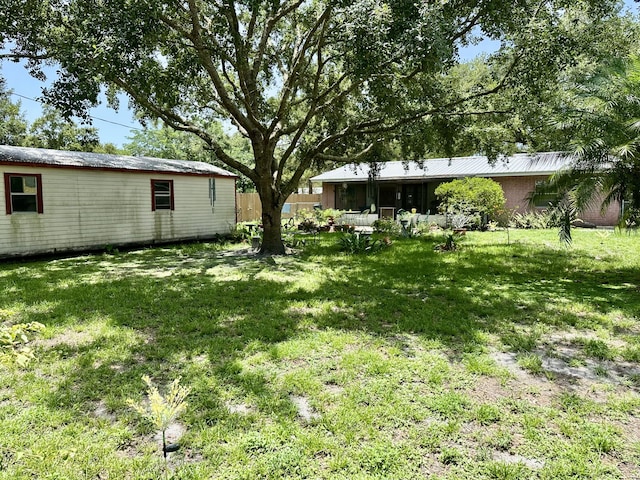 3595 SW 19th St, Okeechobee, FL 34974 - view of yard featuring a sunroom