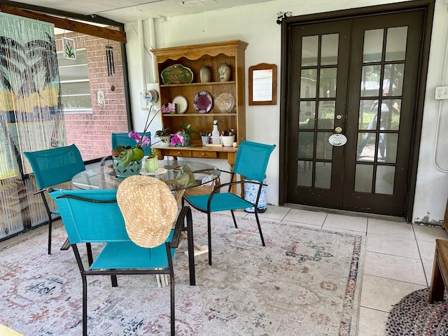 3595 SW 19th St, Okeechobee, FL 34974 - dining area featuring french doors and tile patterned flooring