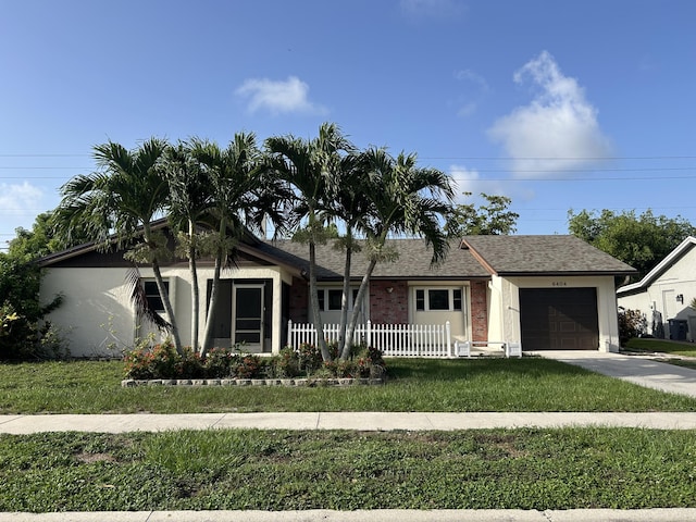 6404 Moonstone Way, Delray Beach, FL 33484 - view of front facade featuring an attached garage, concrete driveway, brick siding, and roof with shingles