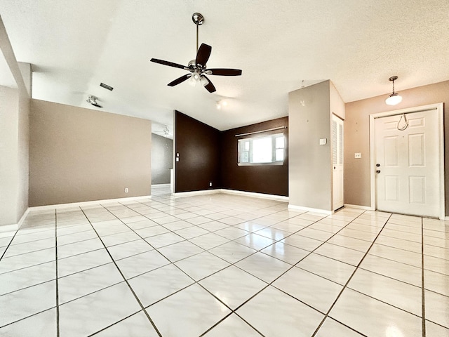 6404 Moonstone Way, Delray Beach, FL 33484 - empty room featuring ceiling fan, vaulted ceiling, and light tile patterned floors