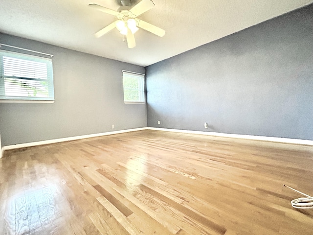 6404 Moonstone Way, Delray Beach, FL 33484 - spare room featuring wood finished floors and ceiling fan