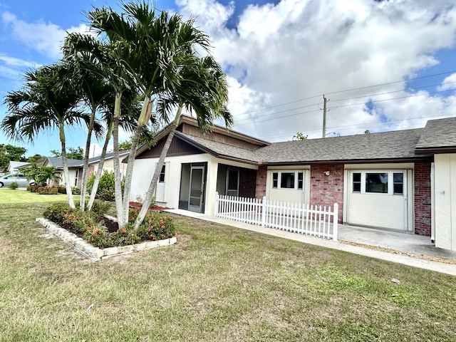 6404 Moonstone Way, Delray Beach, FL 33484 - view of front of property featuring a shingled roof and brick siding