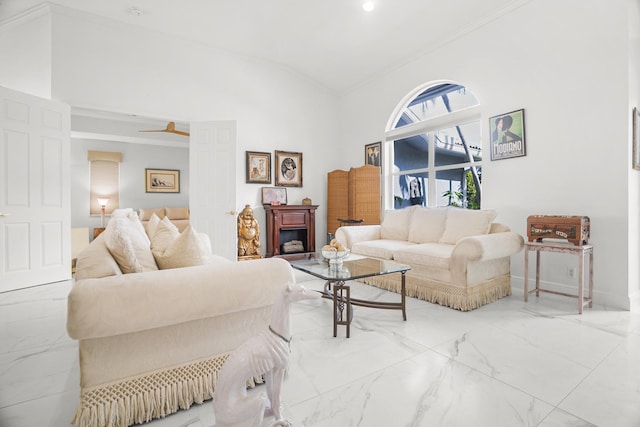 1680 SW 16th St, Boca Raton, FL 33486 - living area with ornamental molding, lofted ceiling, marble finish floors, and a fireplace