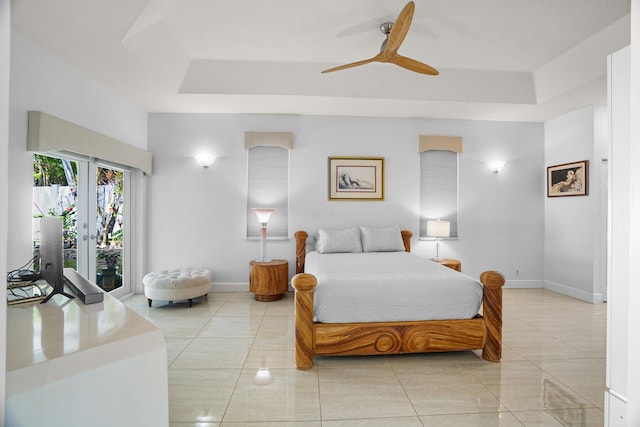 1680 SW 16th St, Boca Raton, FL 33486 - bedroom with a tray ceiling, access to exterior, ceiling fan, and light tile patterned floors