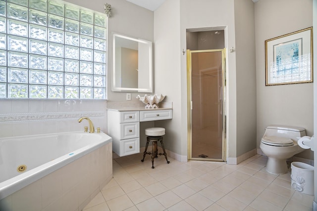 1680 SW 16th St, Boca Raton, FL 33486 - full bathroom featuring a jetted tub, a stall shower, tile patterned floors, and vanity