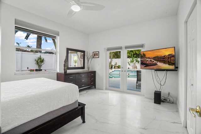 1680 SW 16th St, Boca Raton, FL 33486 - bedroom featuring light marble finish floors, access to exterior, multiple windows, and french doors