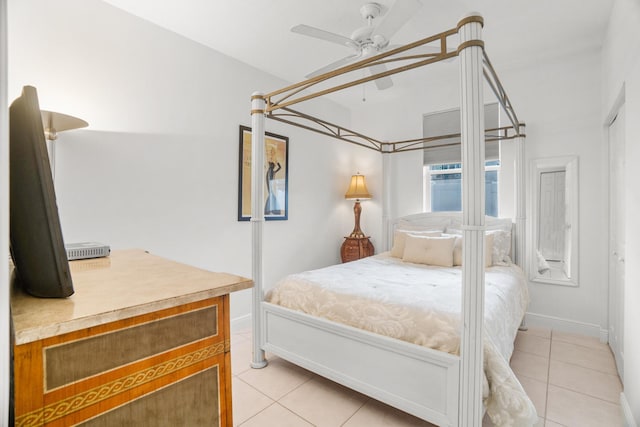 1680 SW 16th St, Boca Raton, FL 33486 - bedroom featuring light tile patterned flooring and a ceiling fan