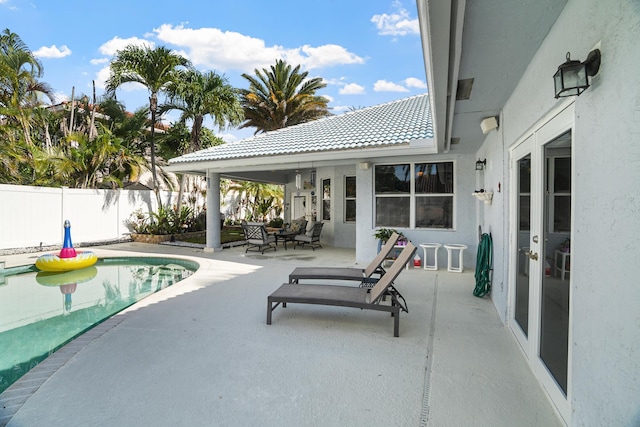 1680 SW 16th St, Boca Raton, FL 33486 - view of pool with a patio and french doors
