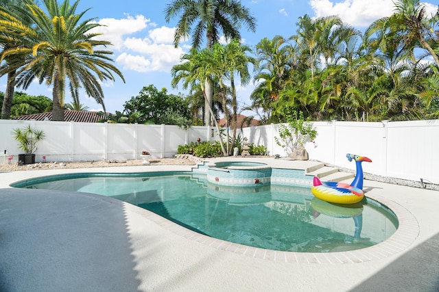 1680 SW 16th St, Boca Raton, FL 33486 - view of pool featuring a fenced backyard and a pool with connected hot tub
