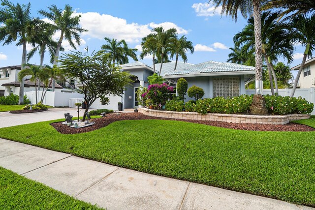 1680 SW 16th St, Boca Raton, FL 33486 - view of front of home with driveway, stucco siding, and a tile roof
