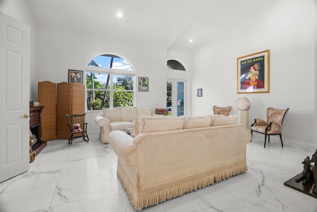 1680 SW 16th St, Boca Raton, FL 33486 - living area featuring light marble finish floors, ornamental molding, recessed lighting, and french doors