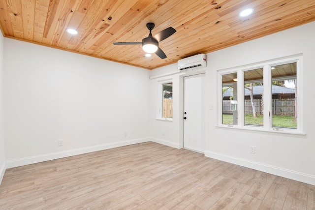677 NE Alice St, Jensen Beach, FL 34957 - spare room with a wall mounted AC, wood ceiling, recessed lighting, light wood-style floors, and a ceiling fan