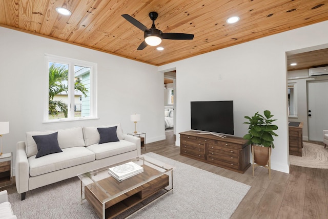 677 NE Alice St, Jensen Beach, FL 34957 - living area featuring an AC wall unit, wooden ceiling, wood finished floors, a ceiling fan, and recessed lighting