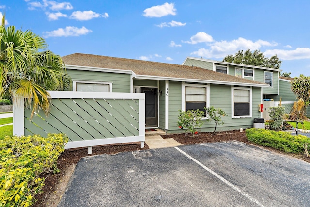 202 Lakewood Dr Unit 11C, Jupiter, FL 33458 - view of front of home with roof with shingles