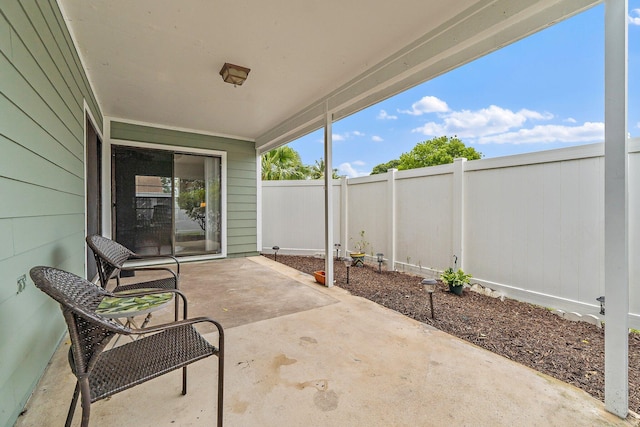 202 Lakewood Dr Unit 11C, Jupiter, FL 33458 - fenced backyard featuring a patio