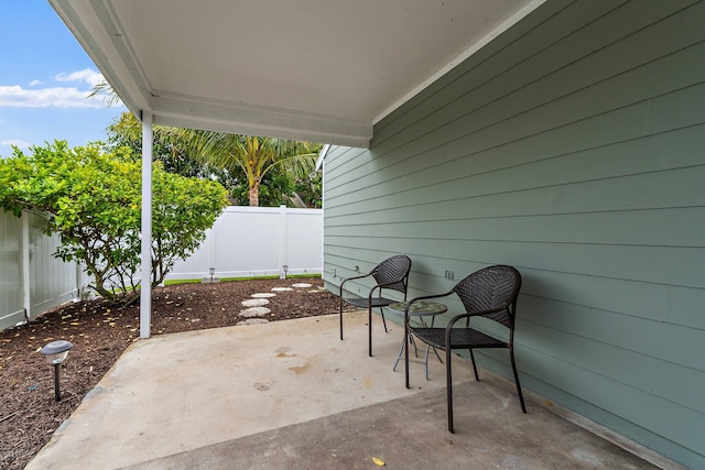 202 Lakewood Dr Unit 11C, Jupiter, FL 33458 - fenced backyard featuring a patio area