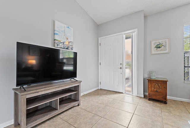 202 Lakewood Dr Unit 11C, Jupiter, FL 33458 - entryway with light tile patterned flooring and baseboards