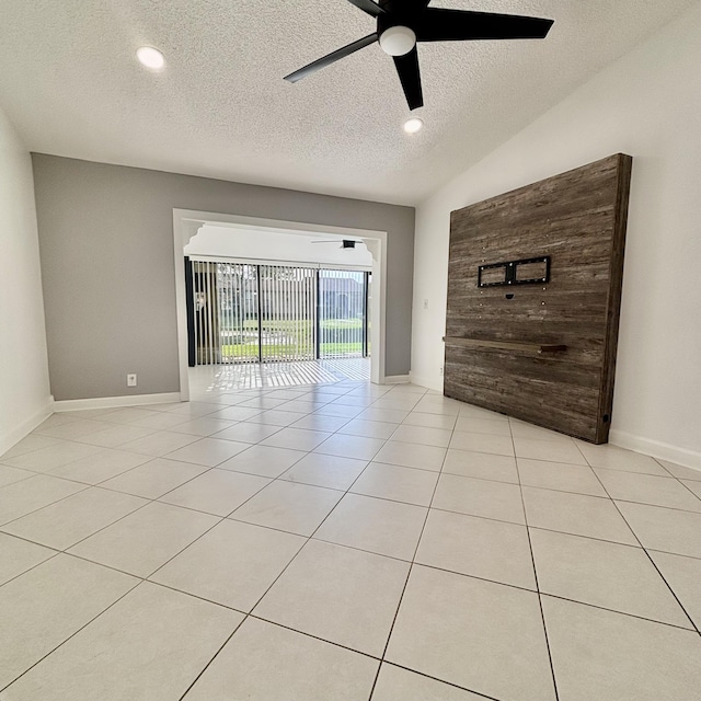 727 Sunny Pine Way Unit H, Greenacres, FL 33415 - unfurnished living room featuring a textured ceiling, a ceiling fan, baseboards, recessed lighting, and light tile patterned floors