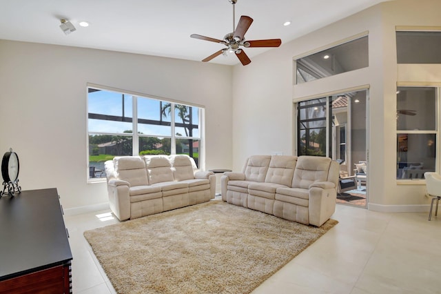 13209 Alhambra Lake Cir, Delray Beach, FL 33446 - living area featuring a ceiling fan, recessed lighting, high vaulted ceiling, and baseboards