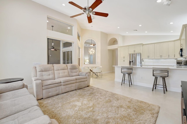 13209 Alhambra Lake Cir, Delray Beach, FL 33446 - living room with ceiling fan, vaulted ceiling, recessed lighting, and baseboards