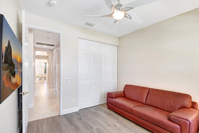 13209 Alhambra Lake Cir, Delray Beach, FL 33446 - living room with ceiling fan, light wood-style flooring, and baseboards