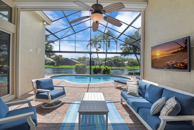 13209 Alhambra Lake Cir, Delray Beach, FL 33446 - swimming pool with an outdoor hangout area, a patio, a lanai, and ceiling fan