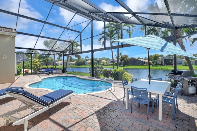 13209 Alhambra Lake Cir, Delray Beach, FL 33446 - swimming pool featuring a patio area, outdoor dining space, a grill, and a water view