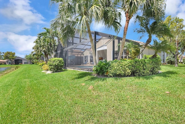 13209 Alhambra Lake Cir, Delray Beach, FL 33446 - view of green lawn featuring a lanai