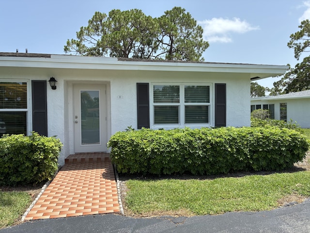 5178 Privet Pl Unit D, Delray Beach, FL 33484 - property entrance featuring stucco siding