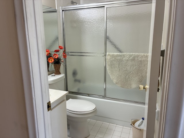 5178 Privet Pl Unit D, Delray Beach, FL 33484 - bathroom featuring tile patterned flooring, shower / bath combination with glass door, toilet, and vanity