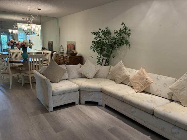 5178 Privet Pl Unit D, Delray Beach, FL 33484 - living room featuring wood finished floors and a chandelier