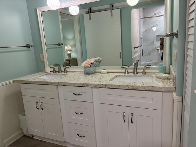 5178 Privet Pl Unit D, Delray Beach, FL 33484 - bathroom featuring double vanity and a stall shower