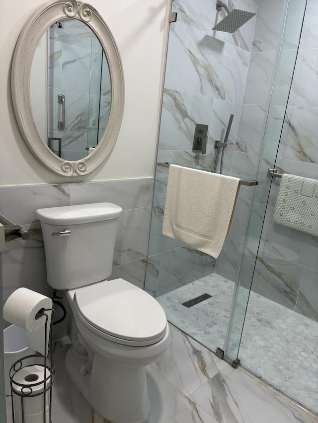 5178 Privet Pl Unit D, Delray Beach, FL 33484 - bathroom featuring a stall shower, marble look tile flooring, and toilet