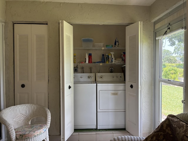 5178 Privet Pl Unit D, Delray Beach, FL 33484 - washroom with independent washer and dryer and light tile patterned floors