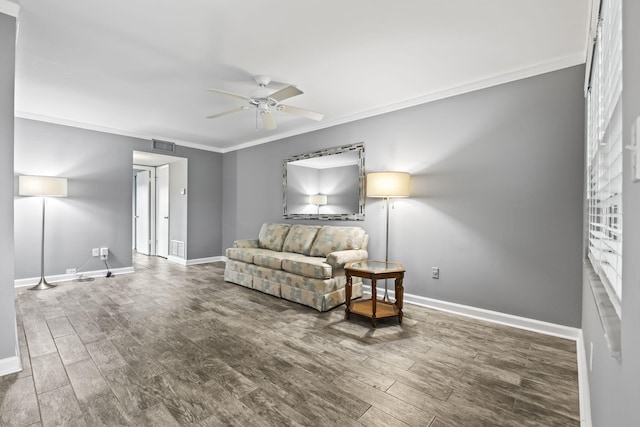 8 Vista Palm Ln Unit 103, Vero Beach, FL 32962 - living area featuring ceiling fan, crown molding, wood finished floors, and baseboards