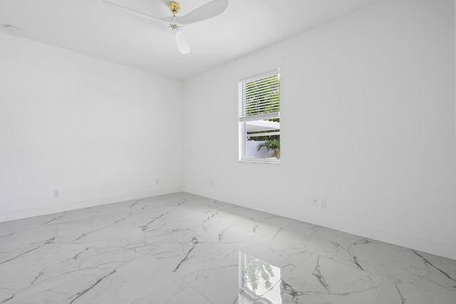 2265 SW Kenwick Ave, Port Saint Lucie, FL 34953 - unfurnished room featuring baseboards and light marble finish flooring