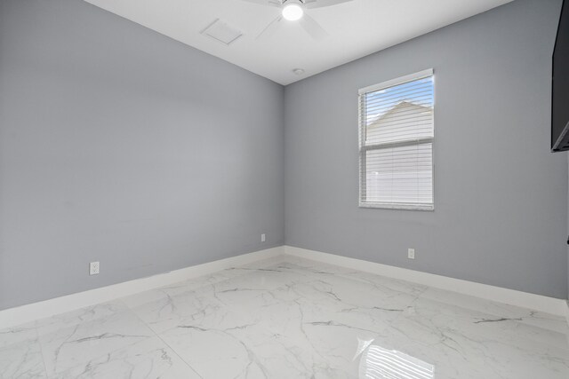 2265 SW Kenwick Ave, Port Saint Lucie, FL 34953 - unfurnished room featuring baseboards and marble look tiles